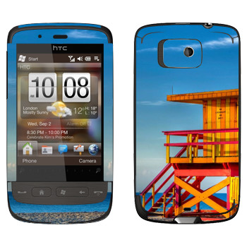   «    »   HTC Touch 2