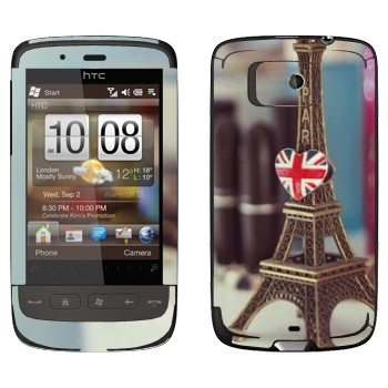   «    »   HTC Touch 2