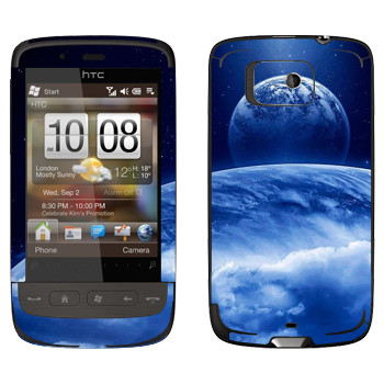   «      »   HTC Touch 2