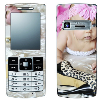   « »   LG S310