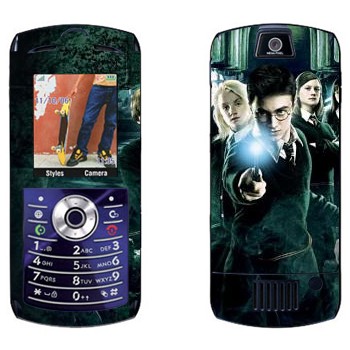   «    »   Motorola L7E Slvr