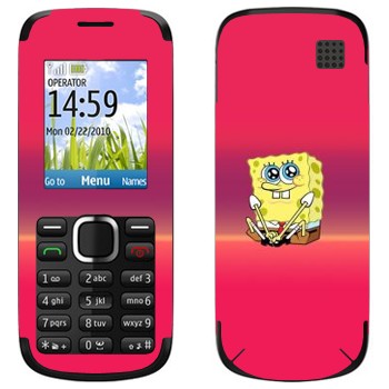   « »   Nokia C1-02