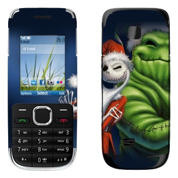   «   -   »   Nokia C2-01