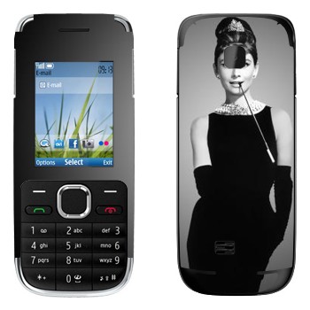   « »   Nokia C2-01