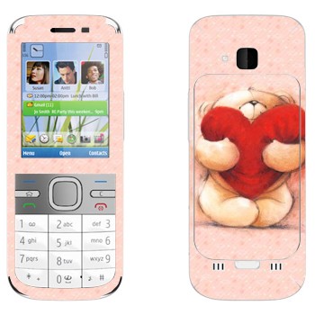   «     »   Nokia C5-00