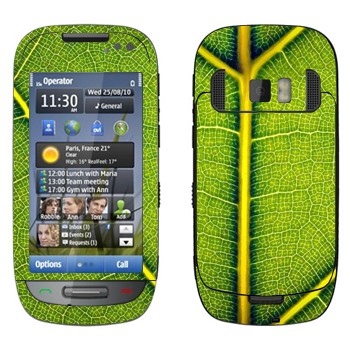   « »   Nokia C7-00