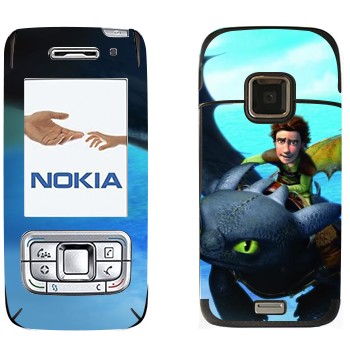   «     »   Nokia E65