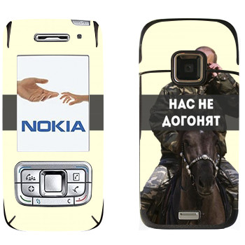  «   -   »   Nokia E65