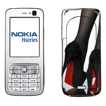   «      »   Nokia N73