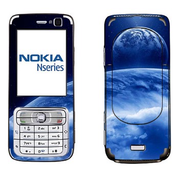   «      »   Nokia N73