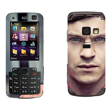   «  - »   Nokia N77