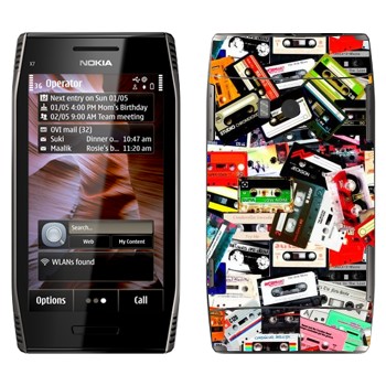   « -»   Nokia X7-00