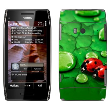  «   »   Nokia X7-00