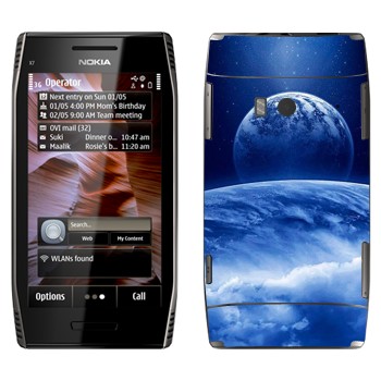   «      »   Nokia X7-00