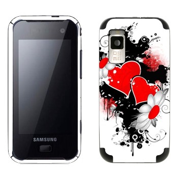   «   -   »   Samsung F700