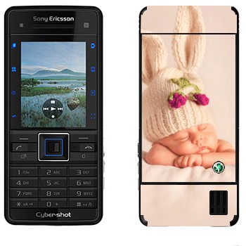   «-»   Sony Ericsson C902
