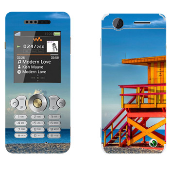   «    »   Sony Ericsson W302