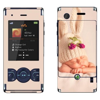   «-»   Sony Ericsson W595