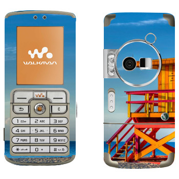   «    »   Sony Ericsson W700