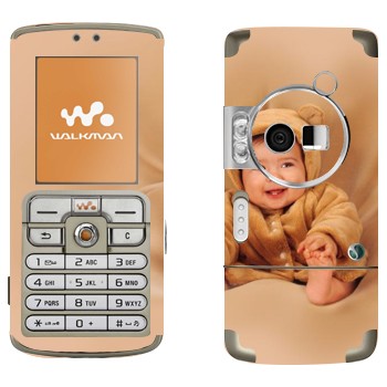   «-»   Sony Ericsson W700