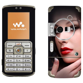   «    »   Sony Ericsson W700