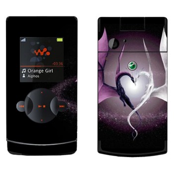   «    »   Sony Ericsson W980